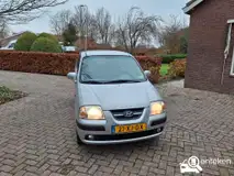 Foto van kenteken 21-XJ-DX