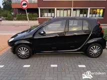 Foto van kenteken 89-TD-RJ